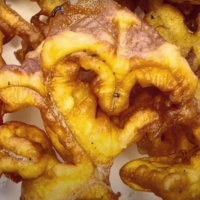 detalle de flores de masa frita de 5 pétalos